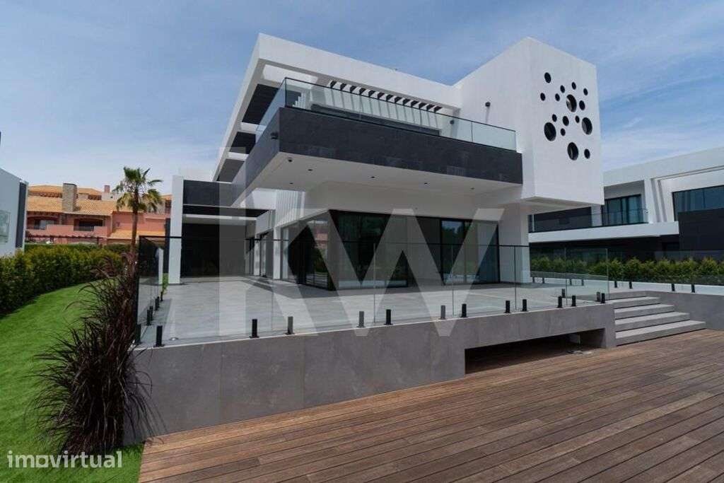 Moradia T4 nova com piscina e jardim junto do campo de Golfe em Vilamo - Grande imagem: 2/48