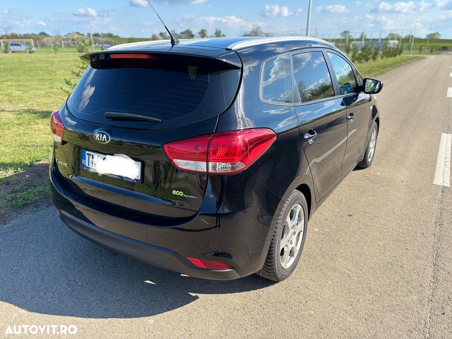 Kia Carens - 5