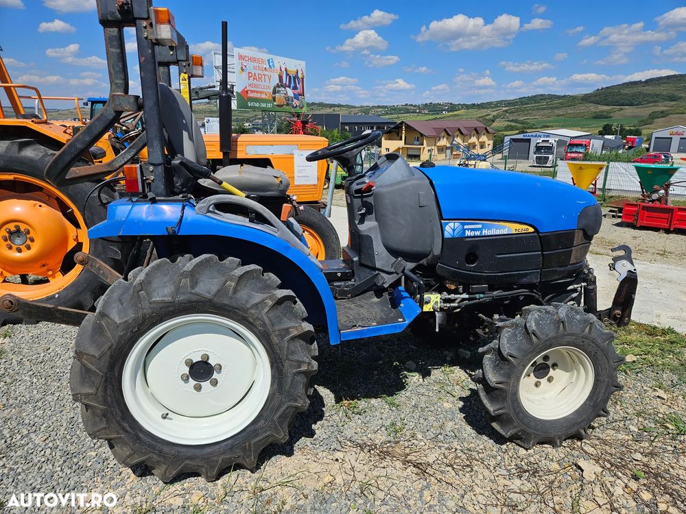 New Holland TC 24 4x4 - 1