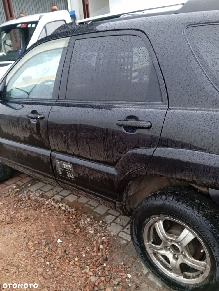 KIA SPORTAGE II DRZWI LEWE TYLNE TYŁ GOŁE 9P - 1