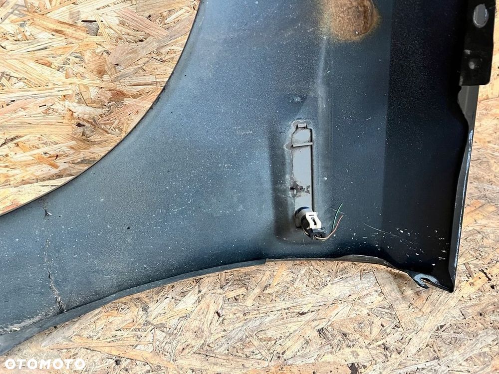 BŁOTNIK prawy OPEL TIGRA B sport Kod lakieru: Z42T - 11