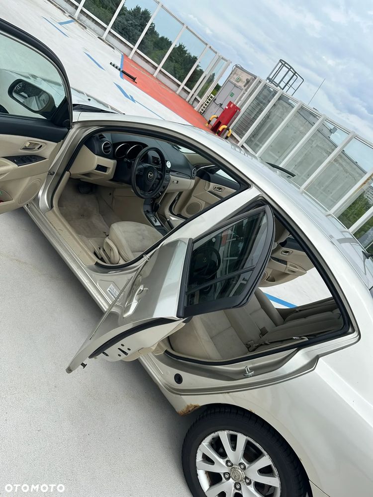 Mazda 3 2.0 Exclusive + - 16