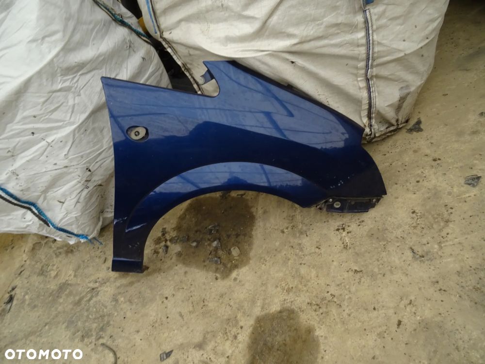 Błotnik Opel Meriva A prawy przód granatowy - 1