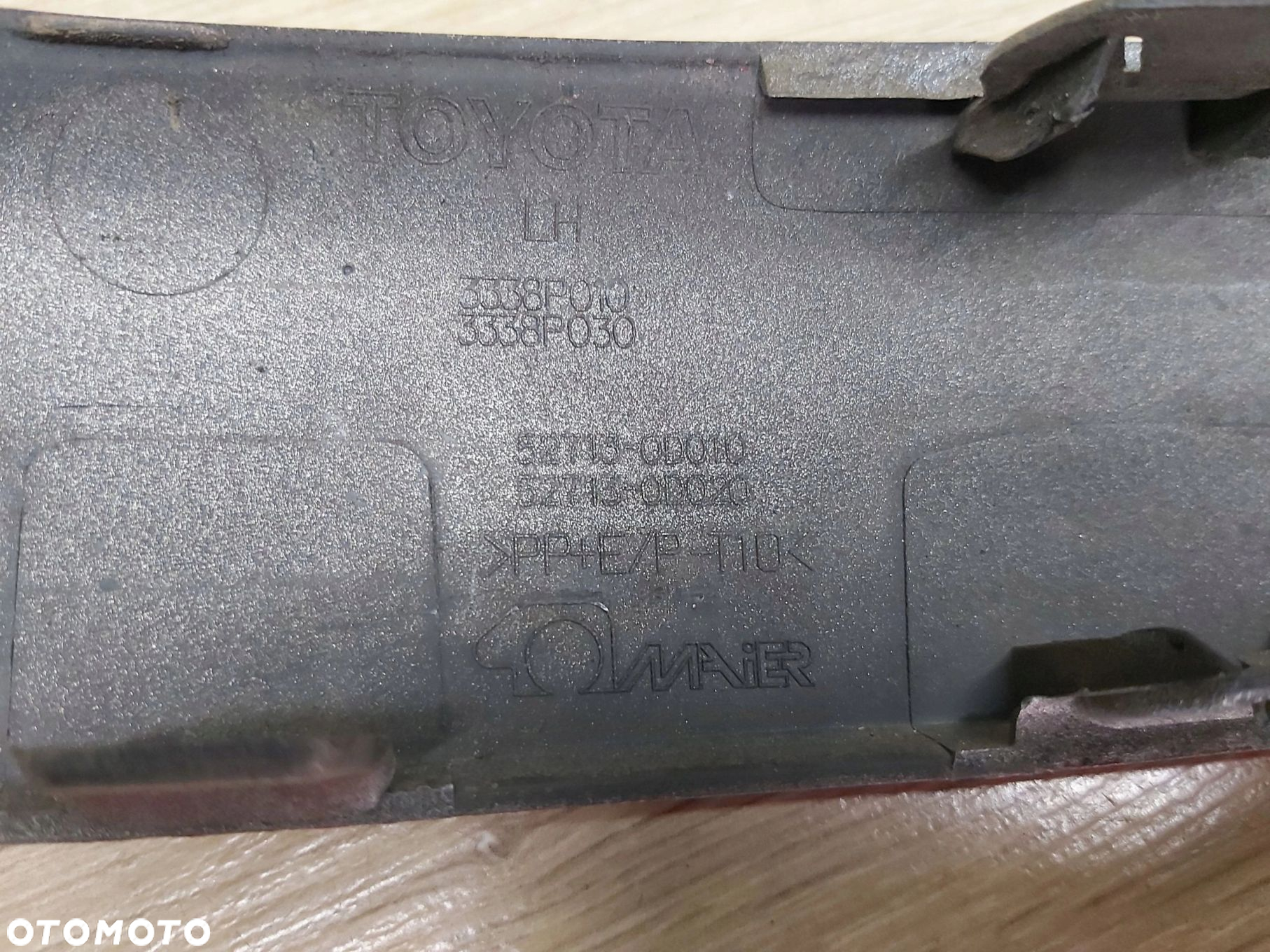 Toyota Yaris I Lift 03-05r listwa zderzaka lewy przód 52715-0D010 - 5