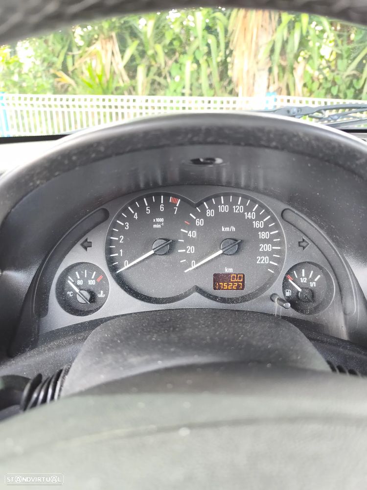 Opel Corsa 1.2 16V Enjoy - 8