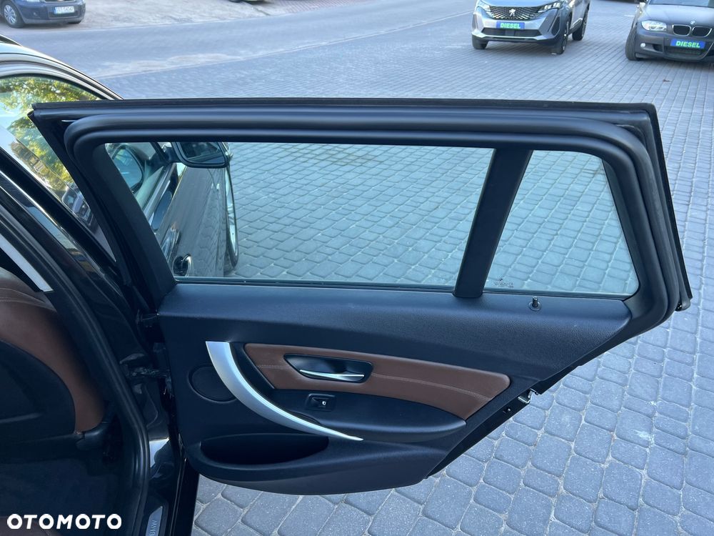 BMW Seria 3 318d Luxury Line - 26