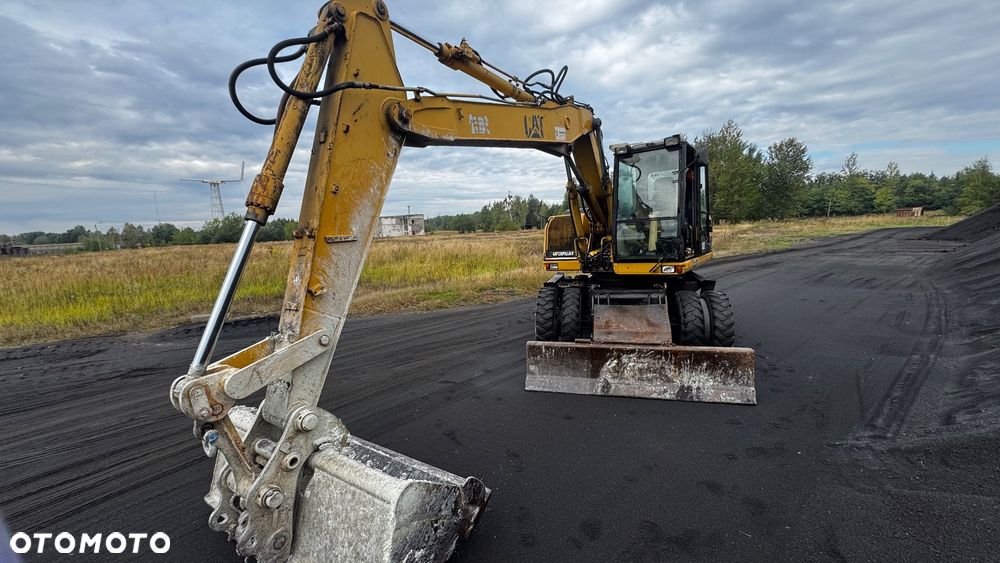 Caterpillar M312 - 1