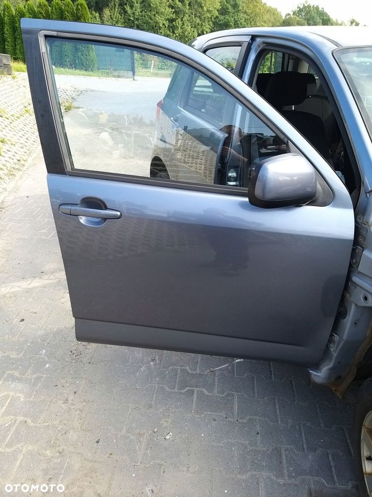 daihatsu terios ii 06r- drzwi prawy przód przednie kompletne kolor s33 - 1