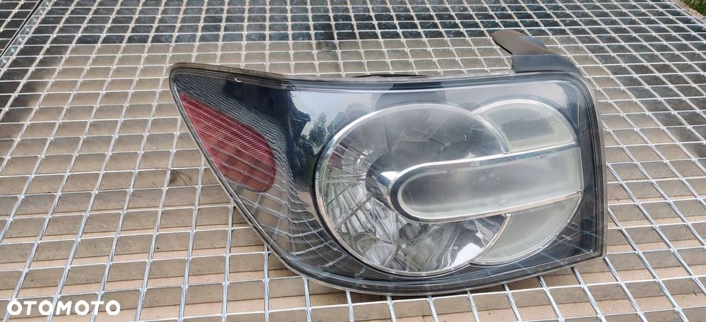 Mazda CX-7 Lampa tylna LEWA LEWY TYŁ - 1