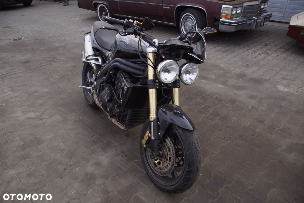 Motocykl na części - Triumph Speed Triple IV 1050 515NJ 131 KM 2005R Silnik Skrzynia Rama Lampa Siedzenie Gmol Przełącznik Manetka Laga Monowahacz Amortyzator Owiewka Osłona Sterownik Moduł Czujnik Licznik - 2