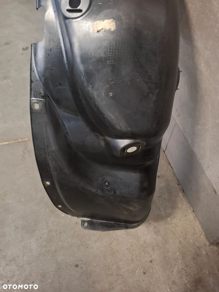 Nadkole lewy tył Kia Rio 2016 rok nr 868231W010 - 2