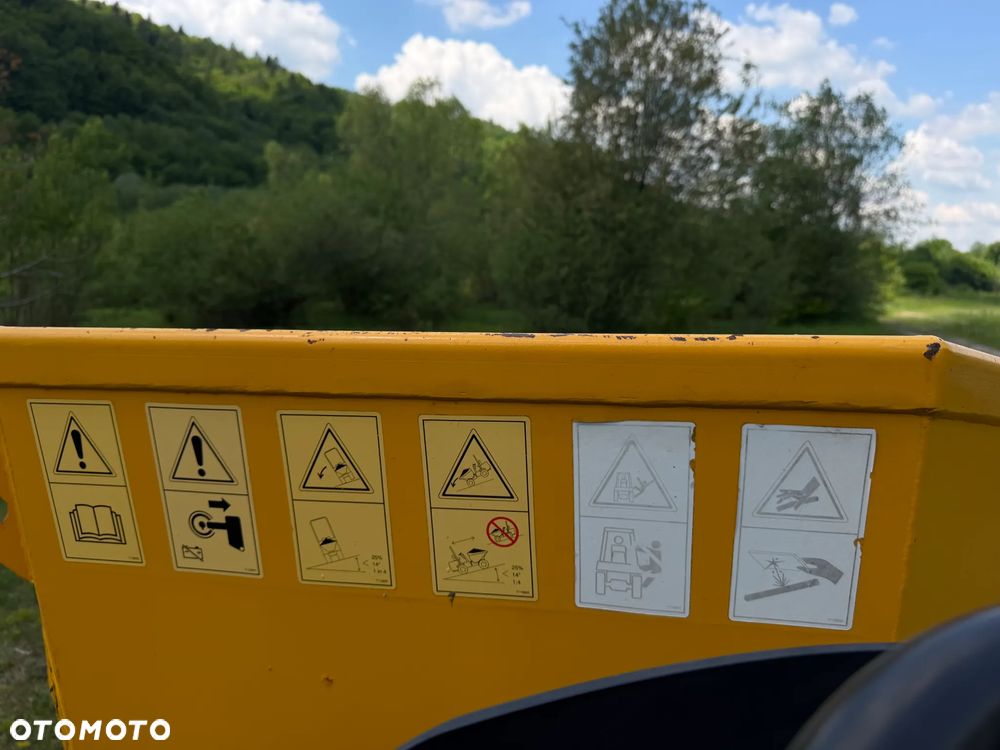 Terex Mecalac TA6s Wozidło wózek z Obrotową Kolebą. 6 ton ładowność. 4x4. Silnik Perkins. 4 cylindry. 808 mtg. 2022 rok. Kamera z wielkim Ekranem! Jazda Rewers 3prędkości. Maszyna jak Nowa z Norweskiego Gospodarstwa! Ani deka luzów i wycieków! Hydrostatic. Pełny Oryginał. Hamulce brzytwa. Serwisy w DEKRA. Maszyna Woziła lekkie ładunki. Praktycznie zerowe zużycie. Wielka Okazja. Wszystko w pełnym Oryginale. Opony Oryginał wszystkie jak Nowe. Komendy Głosowe w maszynie! - 39