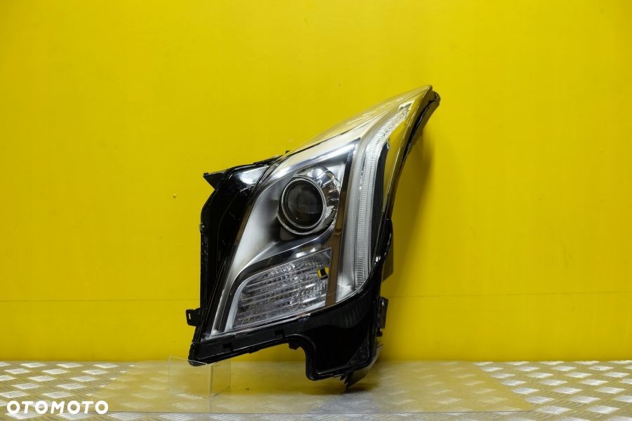 CADILLAC XTS 2013- REFLEKTOR LAMPA LEWA XENON USA - 1