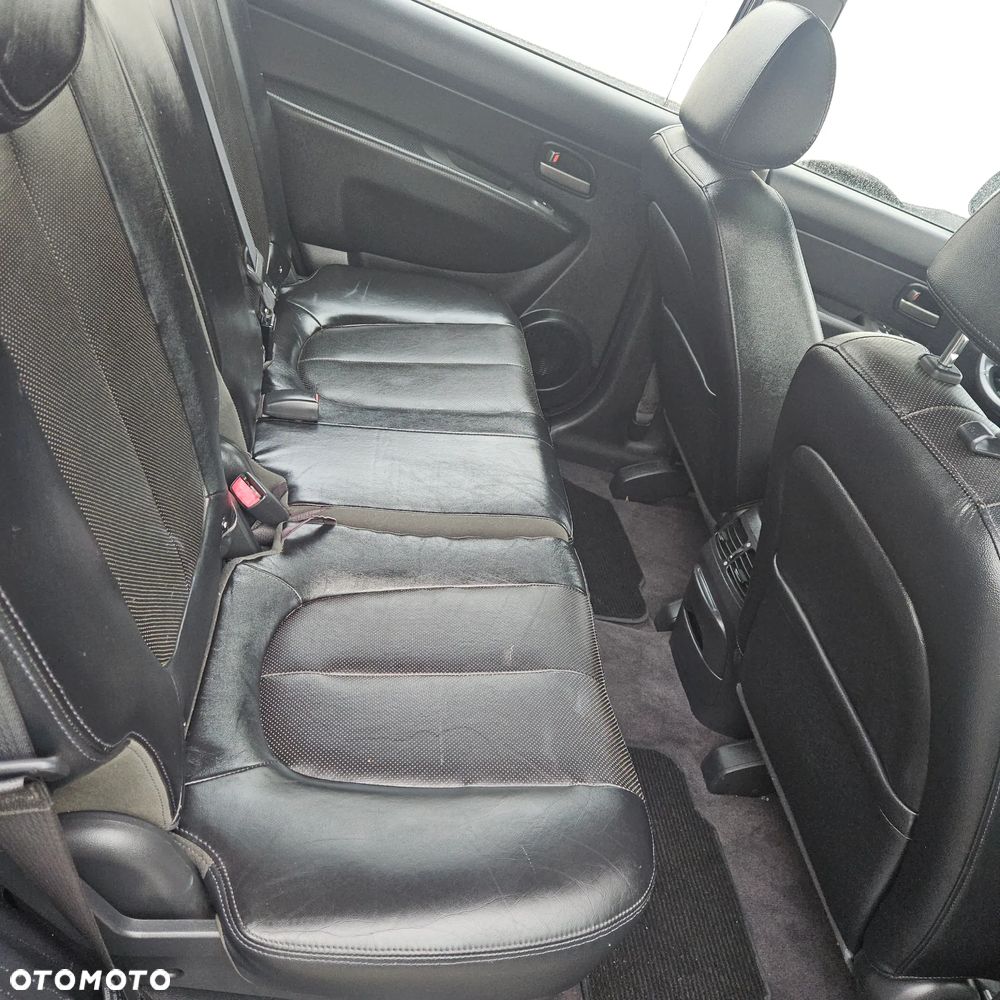 Kia Carens 2.0 CVVT LX Basis - 22