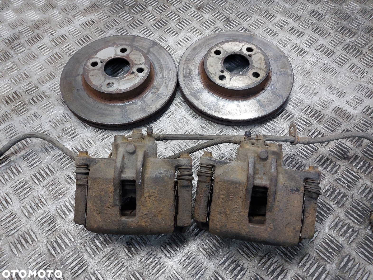 TARCZE HAMULCOWE PRZÓD + KLOCKI + ZACISKI TOYOTA COROLLA E12 1.6 16V - 1