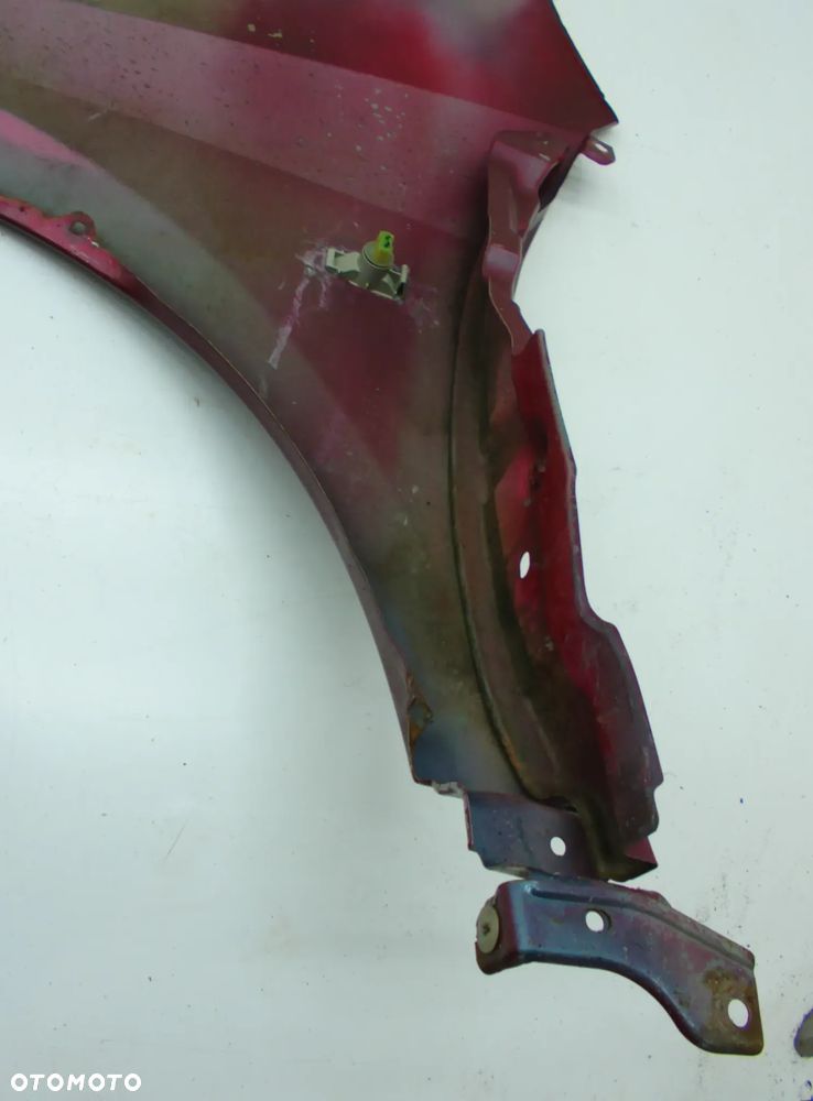 Nissan Primera P12 Błotnik prawy lewy przód bordowy - 17