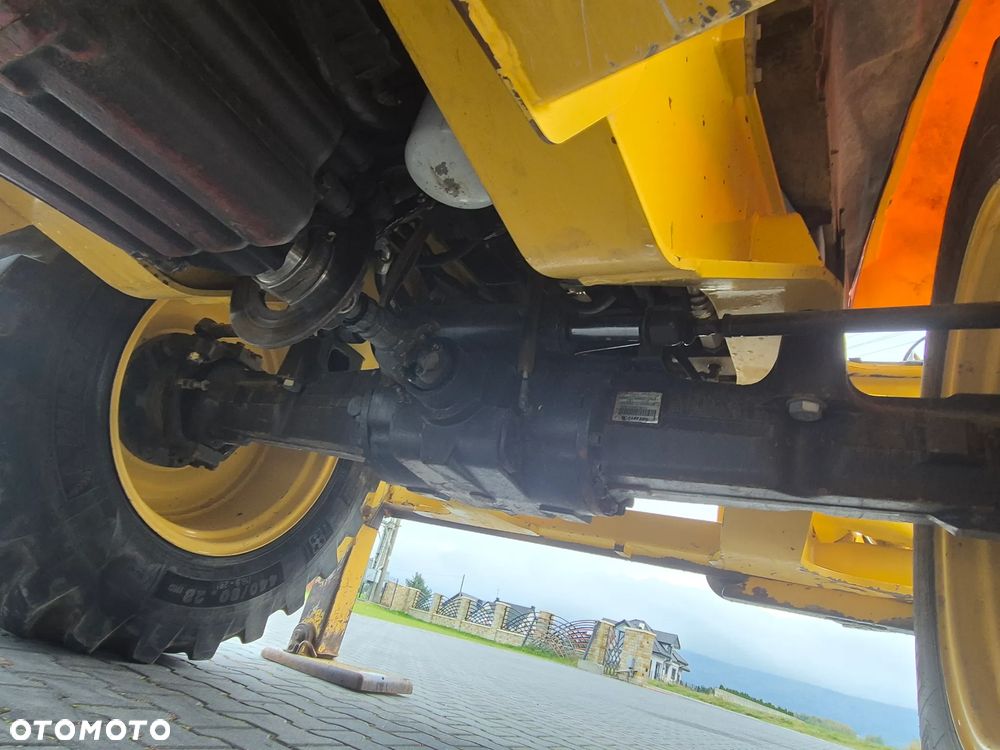 New Holland LB115B/ Maszyna sprowadzona/ - 12