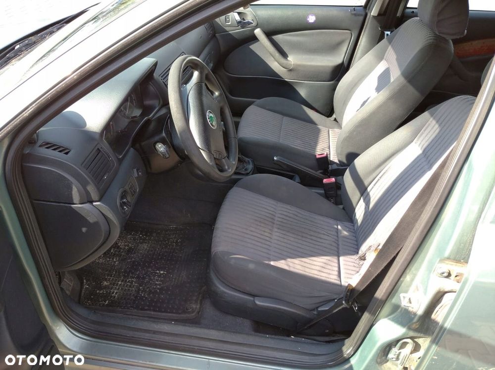 SKODA OCTAVIA I 1U LIFT 00-10 ZDERZAK MASKA LAMPY XENON PAS 9596 M7 / F6G - 11