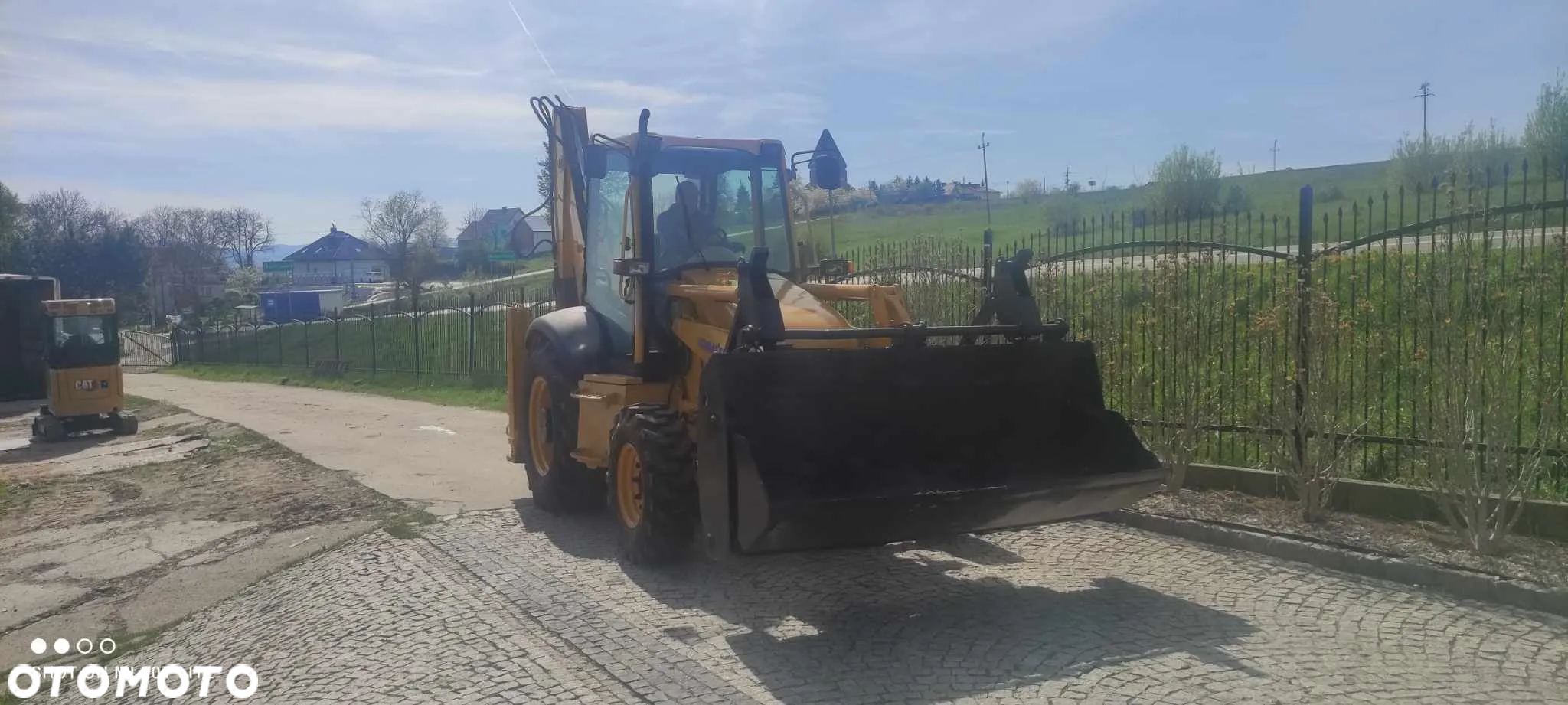 JCB koparko-ładowarka KOMATSU WB97 jcb 3cx - 7