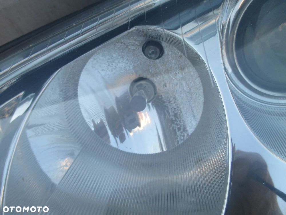 lampa lewa VW Passat B5 lift Hella Europa - 2