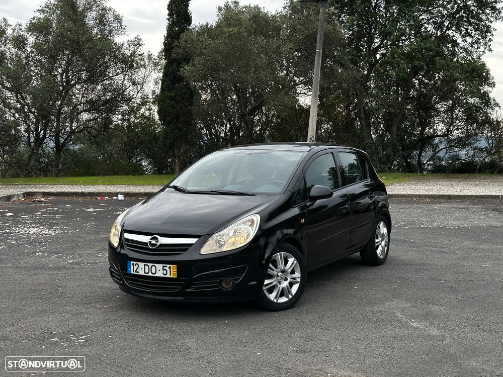 Opel Corsa 1.2 Twinport Cosmo - 1