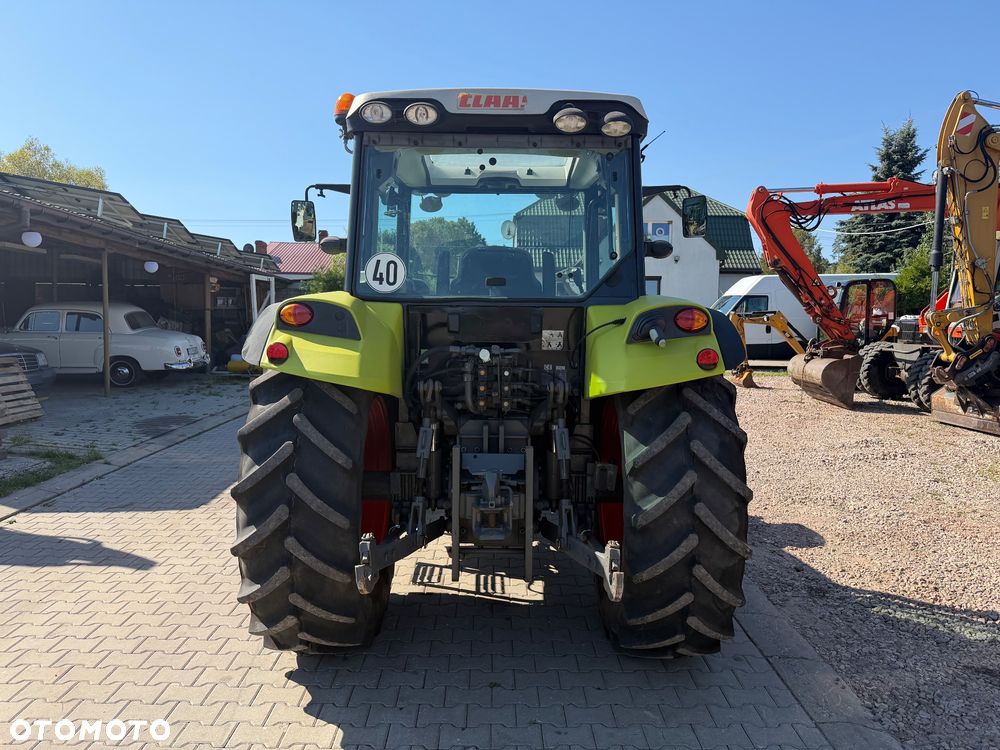 Claas Axos 320 - 3