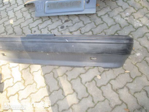 para choques tras toyota corolla 5 portas - 1