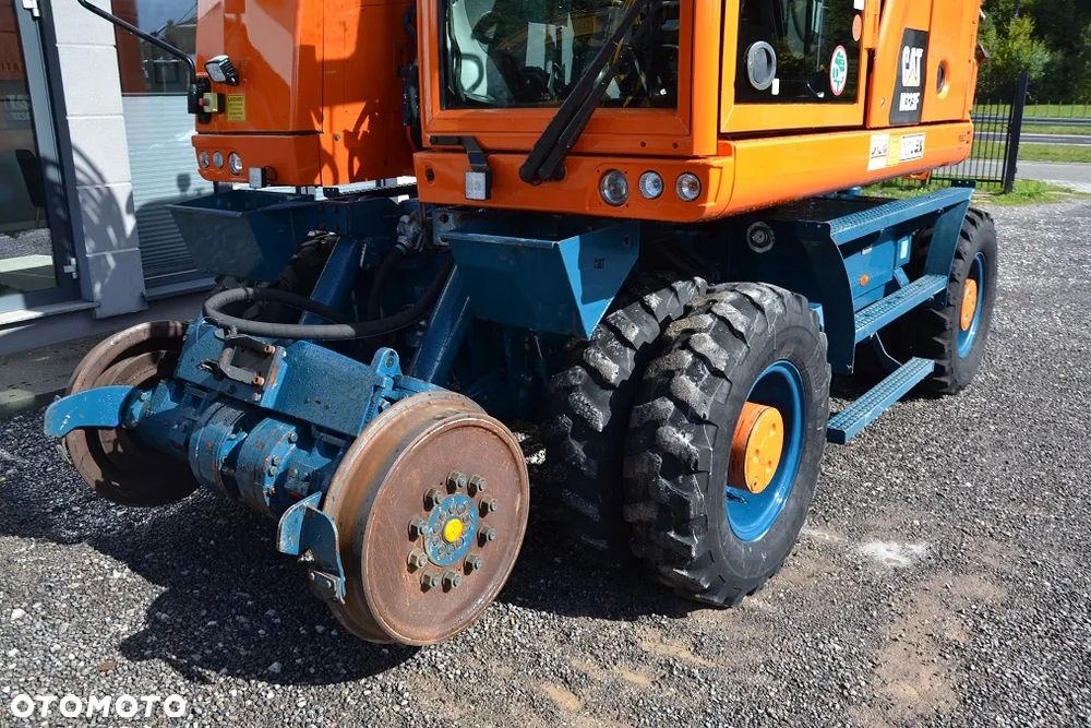 Caterpillar M 323 F, DWUDROGOWA, ROTOTILT - 21