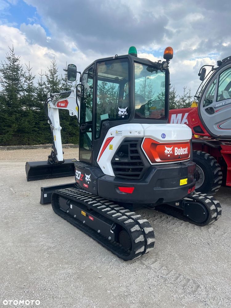 Bobcat Minikoparka Bobcat e50Z 5ton e55 e60 Cat 303.5 304  305 3xłyżki Ramię LOONG dodatkowe linie hydr wyjścia AUX1 + 2 przeciw waga MAX-dociążenie gąsienice 85% od nowości 1 właściciel z Niemiec Auto IDLEE po serwisie Widły wiertnica grabie i inne za dopłatą Szybkozłącze hydr Miller łyżka przedsiębierna Pług  Kubota Takeuchi Jcb - 40
