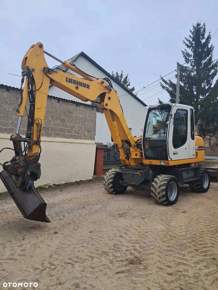 Liebherr 309 Litronic - 2