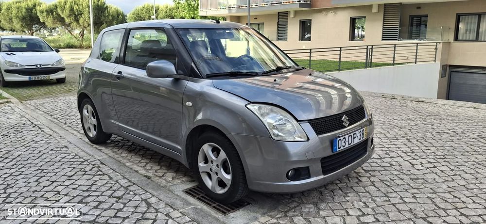 Suzuki Swift 1.3 DDiS GLX - 1