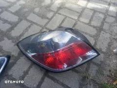 OPEL ASTRA 3  H Lampa Tyl GTC Lewa