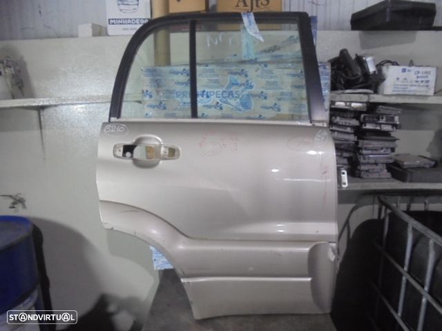 Porta Por3210 SUZUKI GRAND VITARA 2002 2.0TDI 4X4 110CV 5P DOURADO TD - 1