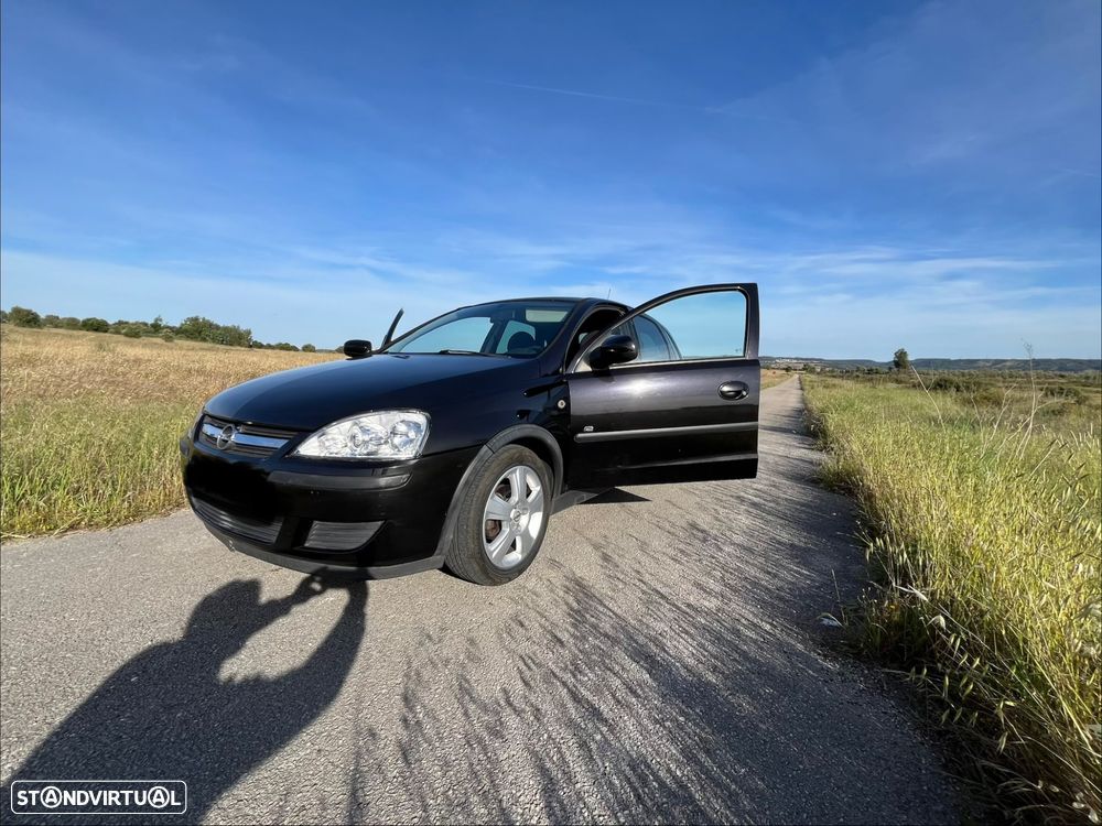 Opel Corsa 1.2 16V Cosmo - 5