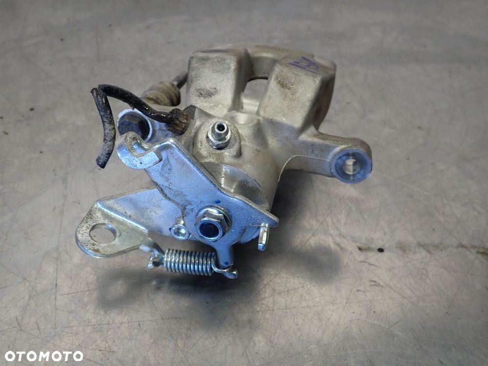 ZACISK HAMULCA PRAWY TYŁ RENAULT MEGANE II 1.6   23TU0009 - 2