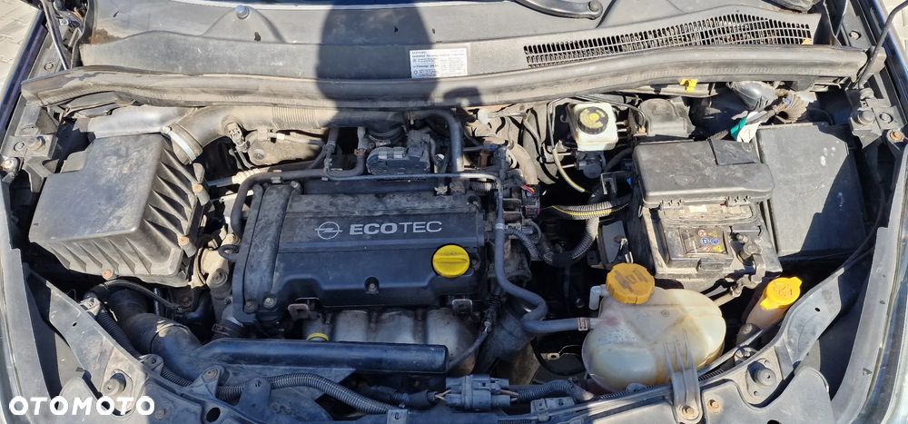 Opel Corsa 1.4 16V Enjoy - 23