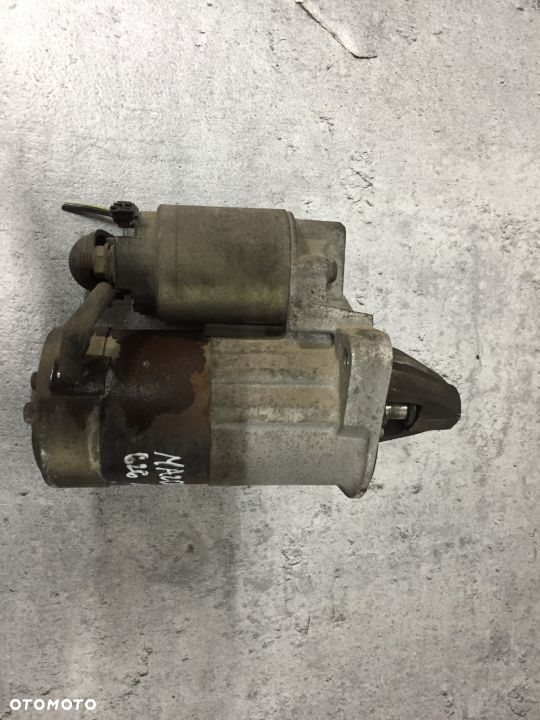 ROZRUSZNIK MAZDA 626 1,8 16V M00T80381 - 2