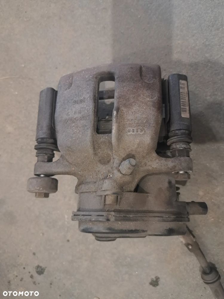 ZACISK HAMULCA LEWY PRAWY TYŁ AUDI Q5  16-20r