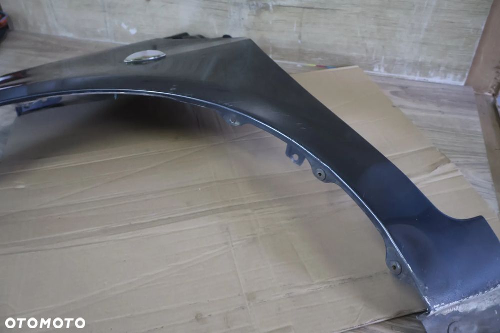 TOYOTA YARIS II 2 LIFT 09-11 BŁOTNIK LEWY PRZÓD PRZEDNI 1G3 - 9