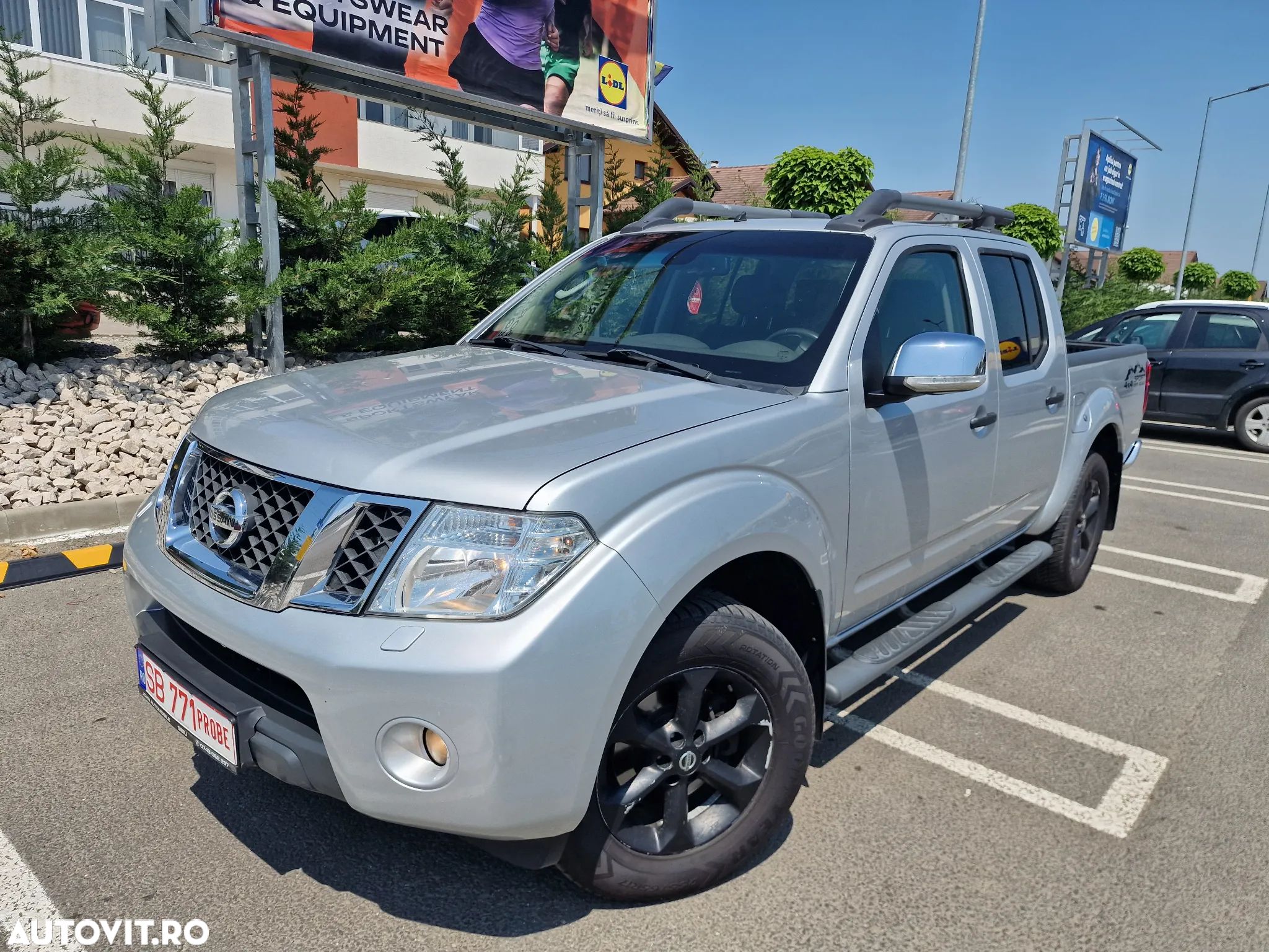 Nissan Navara 2.5 dCi DPF 4X4 Double Cab LE Plus Aut. - 1