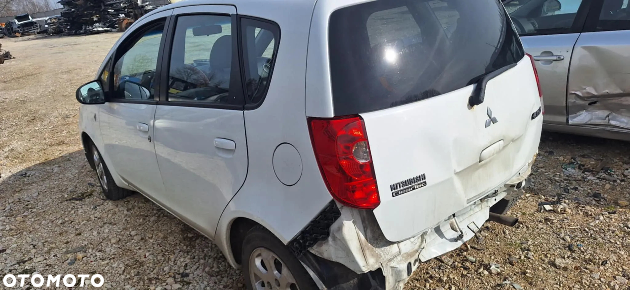 Mitsubishi COLT VI LIFT 1,1 75KM piasta zwrotnica lewy przód - 8