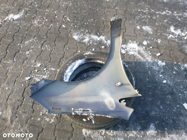 BŁOTNIK LEWY PRZÓD LEWY PRZEDNI OPEL CORSA D Z168 - 16