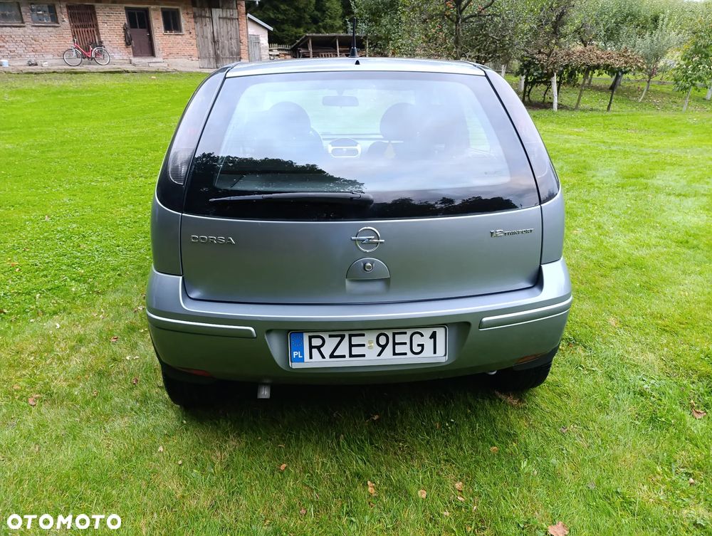 Opel Corsa 1.2 16V Cosmo - 5