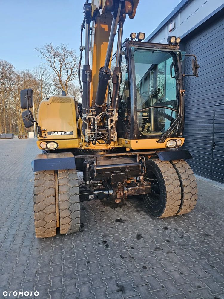 Caterpillar M313D - 8