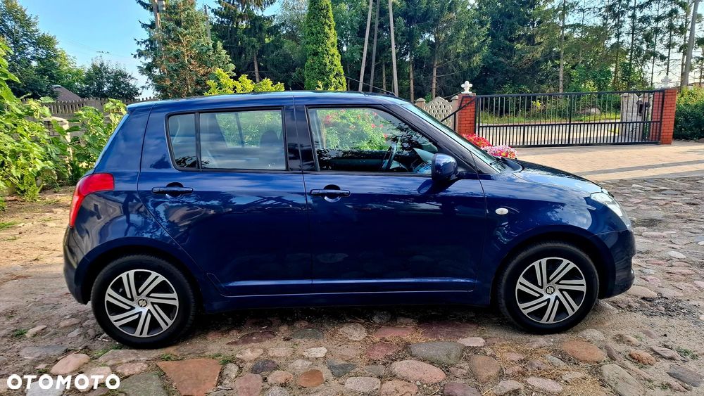 Suzuki Swift 1.3 Club - 4