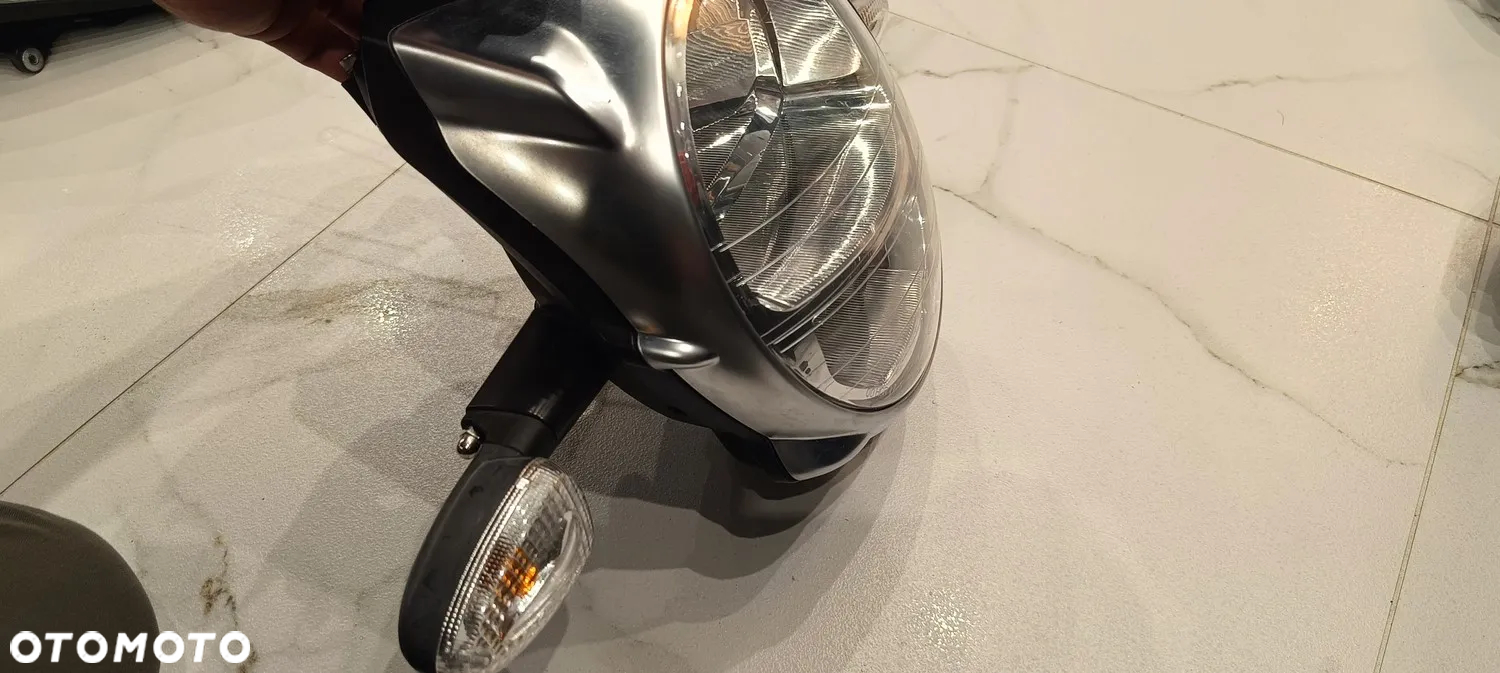 APRILIA MANA 850 REFLEKTOR LAMPA OSŁONA PRZÓD KOMPLET 2008 - 12