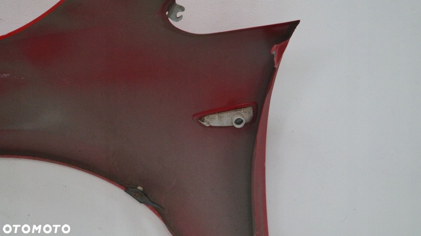 BŁOTNIK PRZEDNI PRAWY OPEL ASTRA J Z50B 2012 - 14