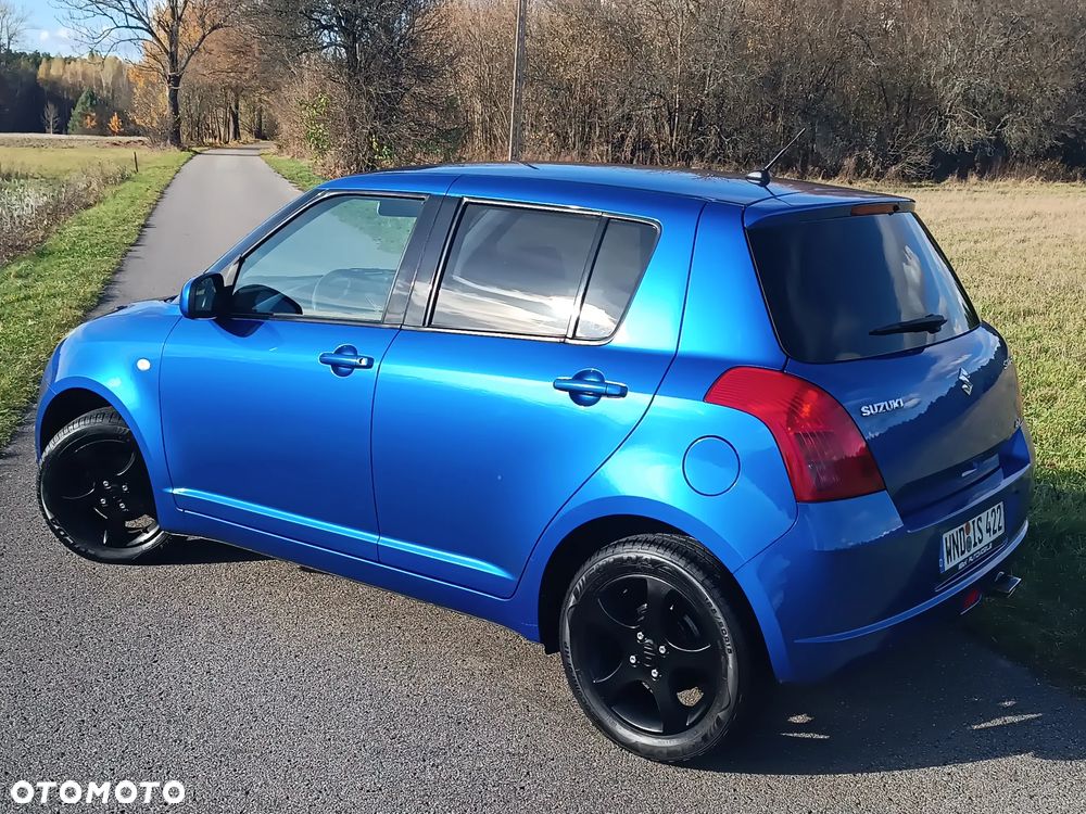 Suzuki Swift 1.2 4x4 Club - 31