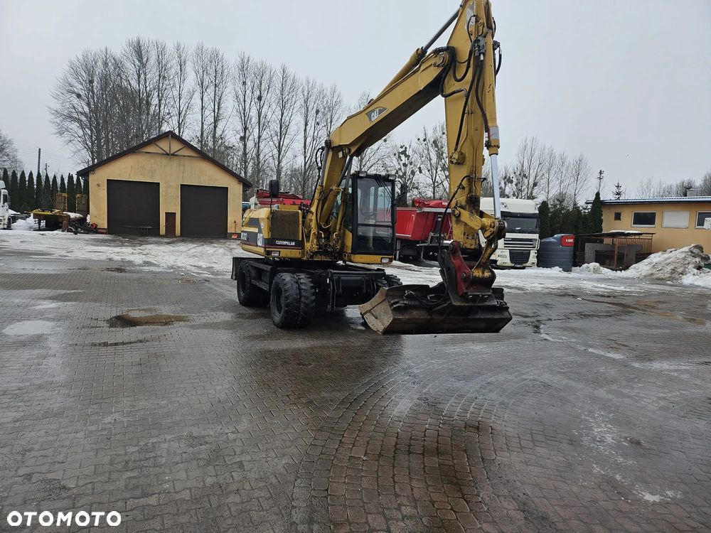 Caterpillar 312 - 6
