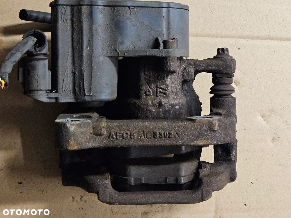 Peugeot 308 T9 zacisk hamulcowy tyl prawy lewy - 7